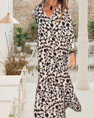 Långärmad lös klänning med V-ringning