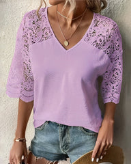 Blus med v-ringad spetsärm