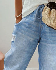 Avslappnad jeans med fickor
