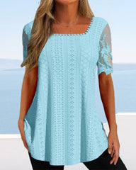 Ihålig broderiblus med kort ärm