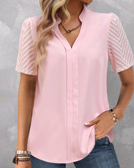 V-ringad enfärgad kortärmad blus