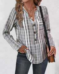 Blus med ledig stil och V-ringning och knappar