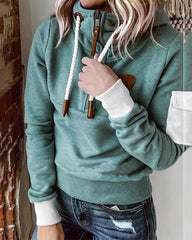 Avslappnad hoodie med halv dragkedja