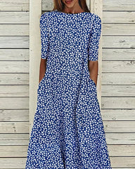 Blommig klänning med fickor