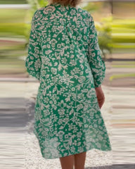 Blommig klänning med v-ringning