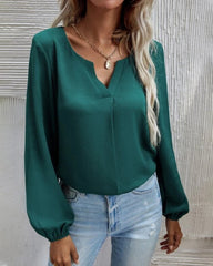 Blus med enfärgad med långärmad