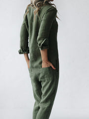 Långärmad jumpsuit med knäppning och avslappnad reversficka