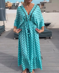 V-ringad klänning med modetryck