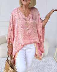 Tryck Lös blus med dolmanärmar