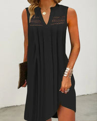 V-ringad ärmlös spetsklänning