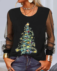 Topp med rund hals och julgranstryck