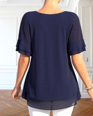 Kortärmad blus med rund hals