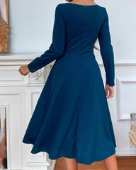 Elegant fast färgklänning