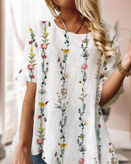 Topp med rund hals i blommönster