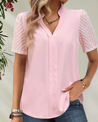 V-ringad enfärgad kortärmad blus