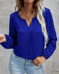 Blus med enfärgad med långärmad