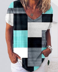 Blommig och plädtryckt T-shirt med korta ärmar