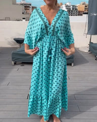 V-ringad klänning med modetryck