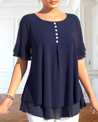 Kortärmad blus med rund hals