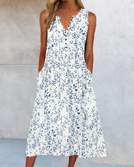 Tankklänning i blommönster med knappar