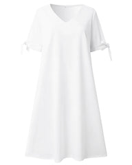 Elegant klänning med delad ärm
