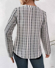 Blus med ledig stil och V-ringning och knappar