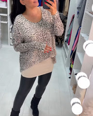 Långärmad topp med leopardmönstret och rund hals