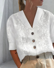 Spetsblus av linne i bomull med blommönster