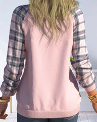 Rutig topp med långa ärmar och V-ringning