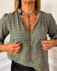 V-ringad ledig blus med geometriskt tryck