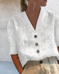 Spetsblus av linne i bomull med blommönster