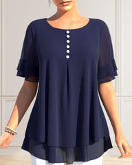Kortärmad blus med rund hals