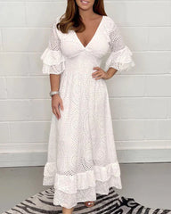 Lös v-ringad enfärgad klänning med hög midja