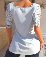 Vit kortärmad topp med spets