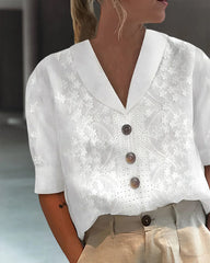 Spetsblus av linne i bomull med blommönster