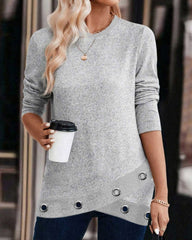 Avslappnad sweatshirt med korsfåll