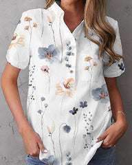 Kortärmad topp med romantiskt tryck