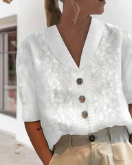 Spetsblus av linne i bomull med blommönster