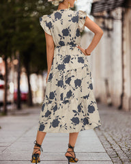 Blommig klänning med volangärmarna