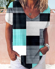 Blommig och plädtryckt T-shirt med korta ärmar