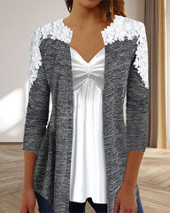 Elegant topp med V-ringning och spets