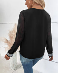Blus med paljetter och V-ringning
