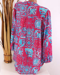 V-ringad avslappnad blus i tryck med lång ärm