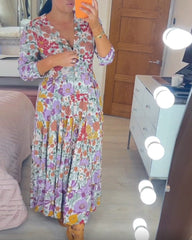 V-ringad långärmad klänning med pastoral tryck