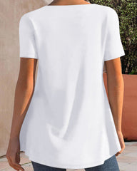 Blus med fjädertryck