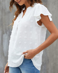 V-ringad enfärgad lotusbladtopp med kortärmar