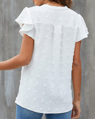 V-ringad enfärgad lotusbladtopp med kortärmar