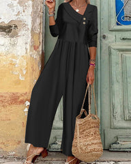 Jumpsuit i enfärgad modell med asymmetrisk krage