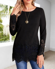 Blus med rund hals och spets