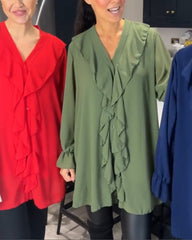 Enfärgad blus med v-ringad lotusblad